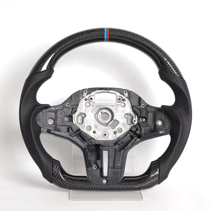 Vekto real carbon fiber heated M Sport steering wheel for BMW G Series M5, M8, X3M, X5, X6, and X7 vehicles.