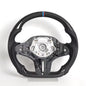 Vekto real carbon fiber heated M Sport steering wheel for BMW G Series M5, M8, X3M, X5, X6, and X7 vehicles.