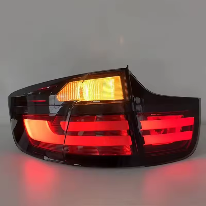 Vekto LED taillights for BMW X6 E71 2007-2014, showing sleek red and clear tail light design on a vehicle.
