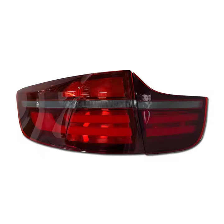 Vekto LED tail lights for BMW X6 E71 2007-2014, close-up of red and clear rear lights with modern design.