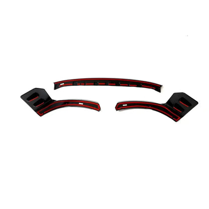 Carbon fiber front bumper lip splitter for BMW M2 G87 coupe by K2 Industries, showcasing sleek aerodynamic design.