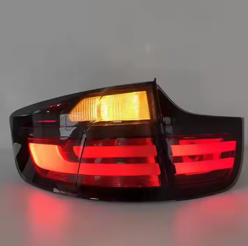 Vekto LED tail lights for BMW X6 E71 E72 2007-2014, showing red and clear lenses with integrated turn signals and brake light features.