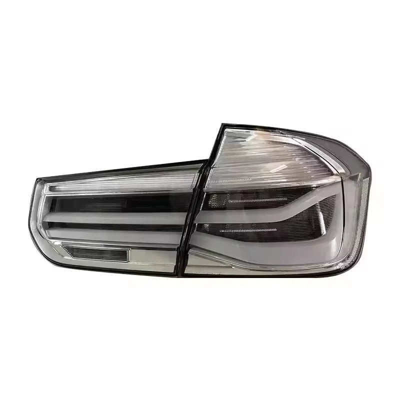 Vekto LED tail lights for BMW 3 Series F30/F35 2012-2018, showing sleek taillight design with illuminated red and clear lenses.