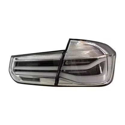 Vekto LED tail lights for BMW 3 Series F30/F35 2012-2018, showing sleek taillight design with illuminated red and clear lenses.