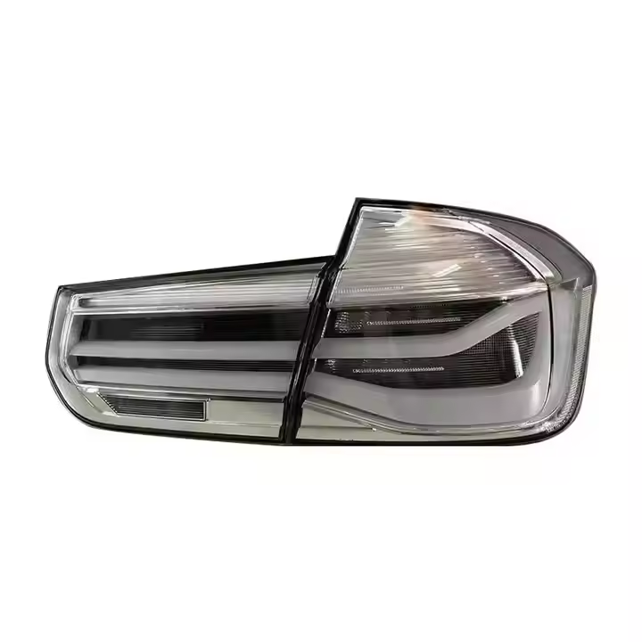 Clear LED tail lights for BMW 3 Series F30/F35 2012-2018 by Vekto, showing the sleek taillight design and bright LED elements.