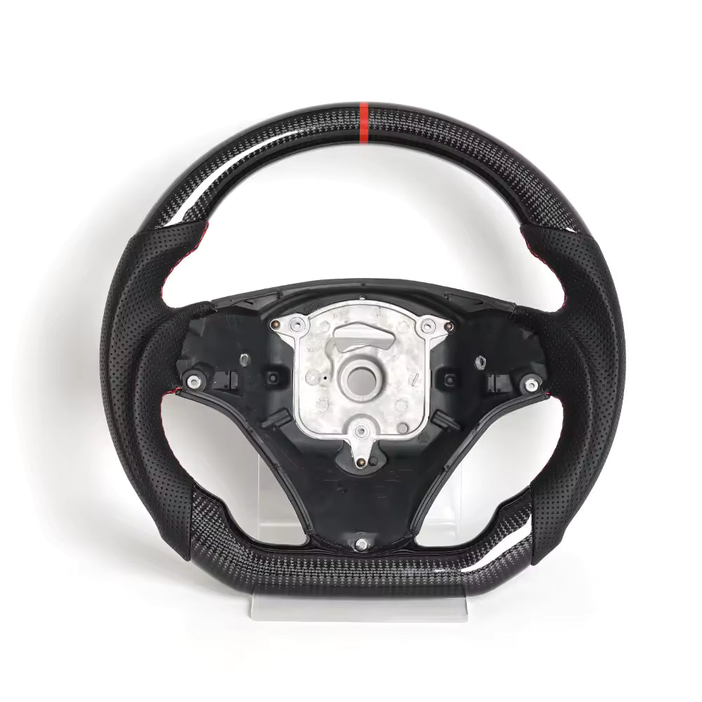 Vekto carbon fiber steering wheel for BMW E90 E92 E93 manual, close-up view showcasing sleek design and textured surface.