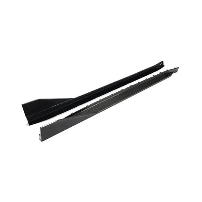 Carbon fiber side skirt extensions for BMW G82 and G83 M4 by K2 Industries, showcasing sleek, aerodynamic design.