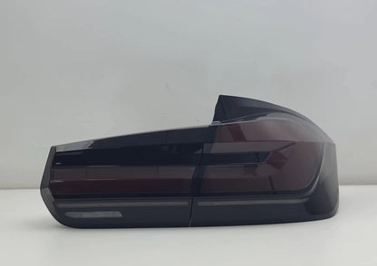 BMW 3 Series F30/F35 G30 LED taillights in red and white by Vekto, showcasing sleek automotive lighting for 2012-2018 models.