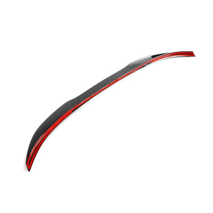 Dry carbon fiber rear trunk spoiler for BMW F30/F35 3 Series and F80 M3 by K2 Industries, shown on a black BMW sedan.