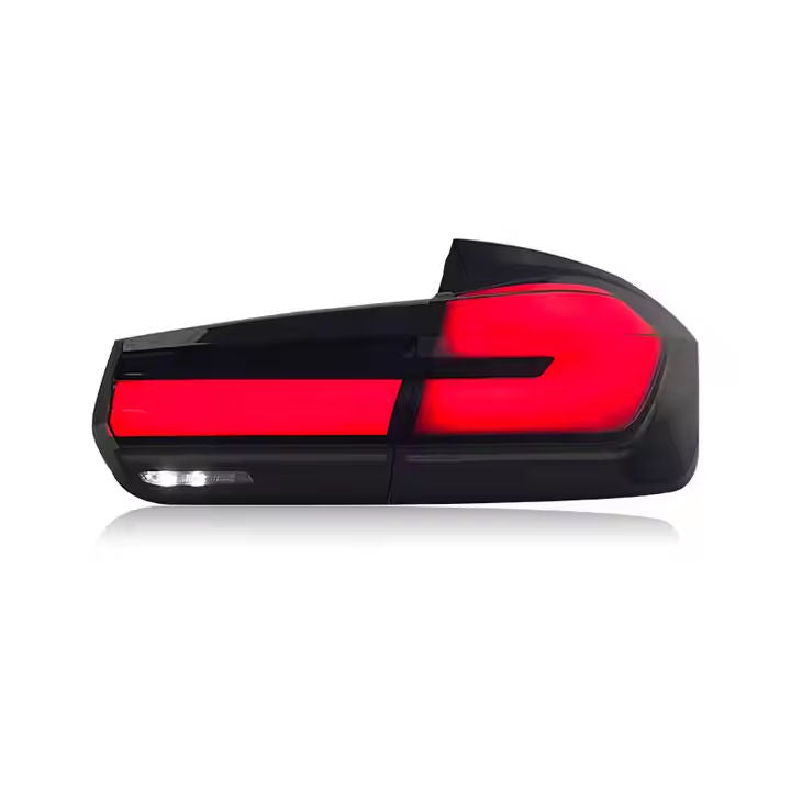 BMW 3 Series F30/F35 G30 style LED taillights in red and white for 2012-2018 models, by Vekto, showing illuminated rear lights.