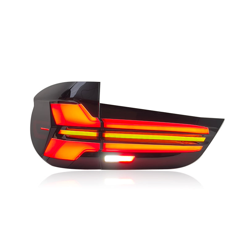 Vekto LED taillights for BMW X5 F15 2014-2018, close-up of sleek red and clear tail light assembly on vehicle.