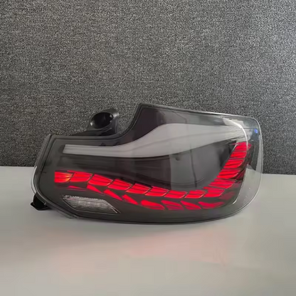 Vekto GTS Dragon Scale LED taillights for BMW 2 Series F22 2014-2021, showing sleek dragon scale design and bright LED illumination.