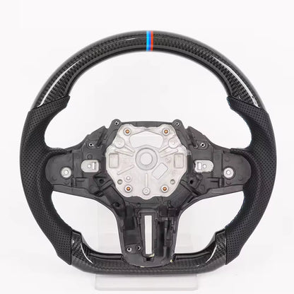 Vekto heated carbon fiber steering wheel for BMW G20 G80 G82 M3 M4, showing the sleek black carbon fiber surface and ergonomic design.
