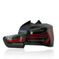 Vekto CSL style LED tail lights for BMW 1 Series F20/F21 LCI hatchback 2015-2018, showing sleek red and clear lens design.