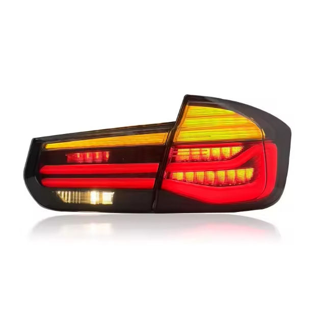 Vekto LED tail lights for BMW 3 Series F30/F35 2012-2018, showcasing sleek design and bright illumination on vehicle rear.