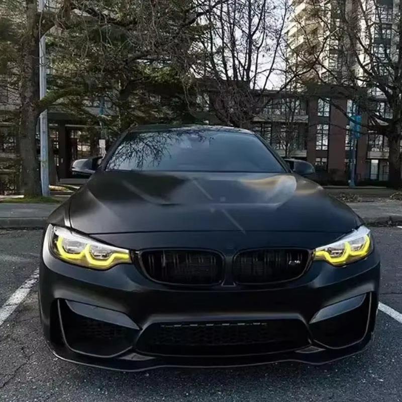 Vekto CSL yellow LED DRL modules installed in BMW F80 M3 and F82 M4 LCI headlights, showcasing bright yellow daytime running lights.