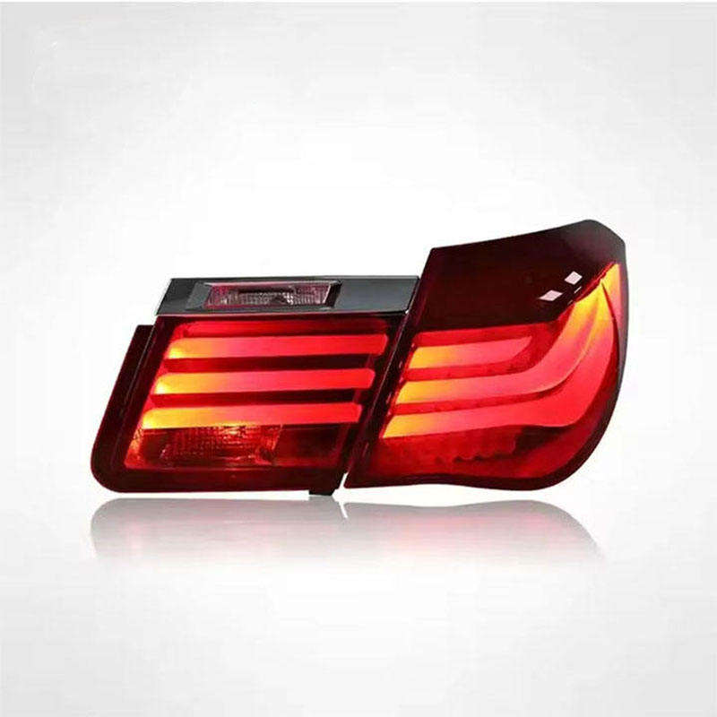 Vekto LED tail lights for BMW 7 Series F01 F02 2009-2015, showing sleek red and clear lens design for enhanced visibility.