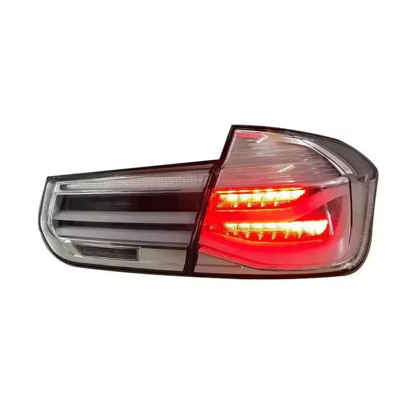Vekto MP Style clear LED tail lights for BMW 3 Series F30/F35 2012-2018 showing sleek, modern taillight design on a vehicle.
