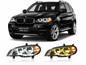 Vekto LED headlights for BMW X5 E70 2008-2013, showing the sleek headlight design with bright LED bulbs and clear lens.