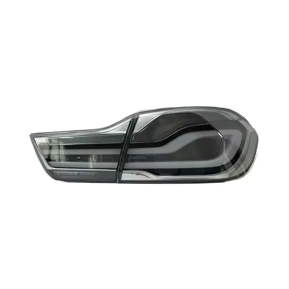 Clear LED BMW 4 Series tail lights by Vekto, showing sleek, modern design with bright LED illumination for F32, F82, and F83 models.