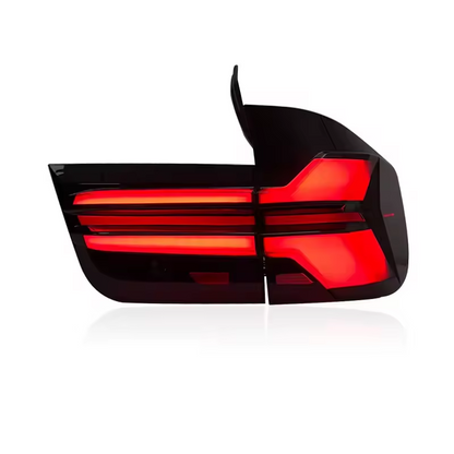 Vekto LED tail lights for BMW X5 E70 rear lamp assembly, 2007-2013, showing illuminated brake and turn signals.