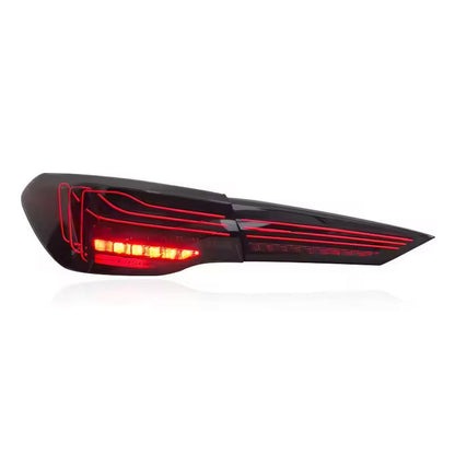 Vekto CSL style LED tail lights for BMW 4 Series G22 and M4 G82, 2018-2022, showing sleek, illuminated taillight design.