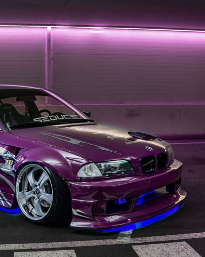 BMW 3-Series E46 sedan over fender kit with vented front fenders, made of ABS or fiberglass, by K2 Industries.