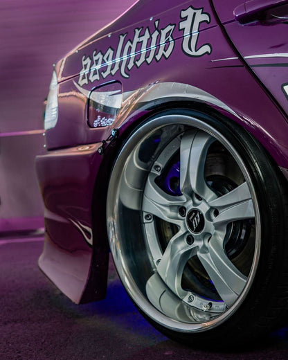 BMW 3-Series E46 sedan over fender kit with vented front fenders, available in ABS or fiberglass, by K2 Industries.