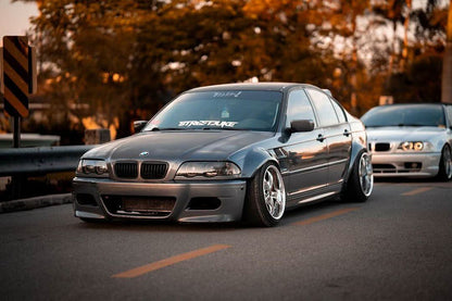 K2 Industries BMW 3-Series E46 Sedan full over fender kit with vented front fenders, made of ABS or fiberglass, shown on vehicle.