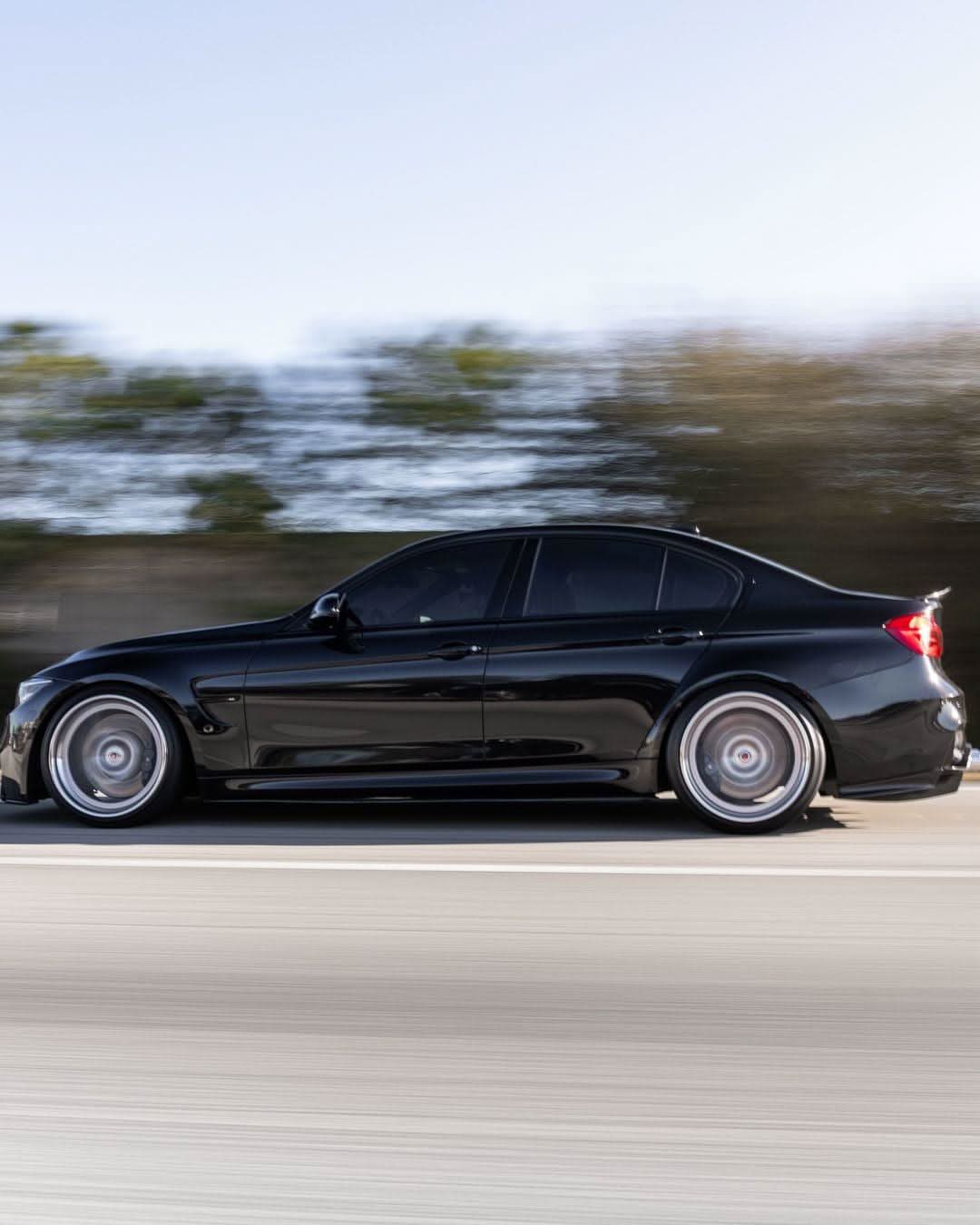 BMW 3 Series F30 F35 M3 F80 sedan with K2 Industries PSM style carbon fiber trunk spoiler, shown on a 2011-2019 model.