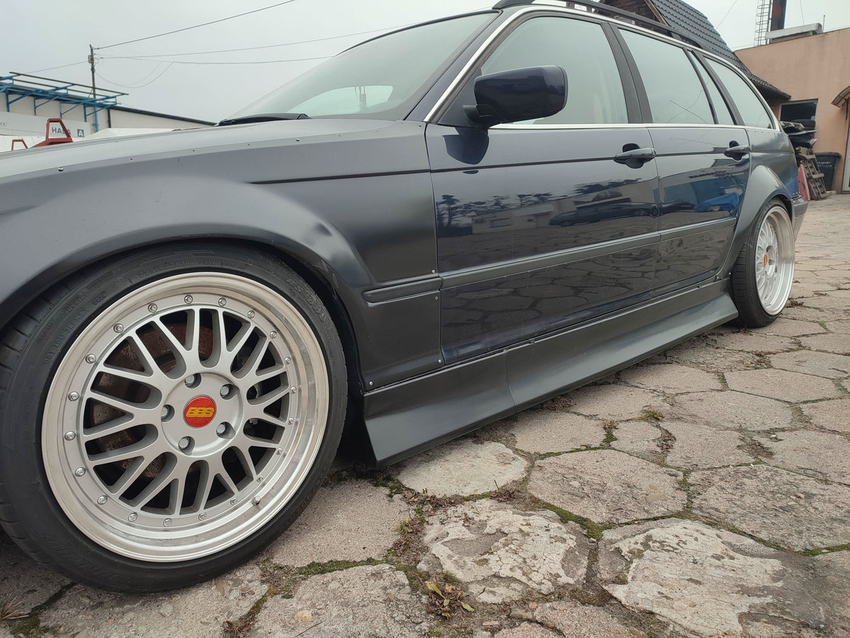 BMW 3-Series E46 sedan full JDM body kit by K2 Industries, made of ABS plastic, includes front and rear bumper components.