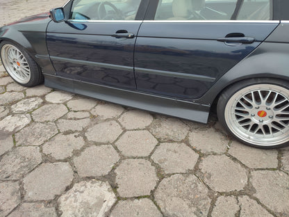 BMW 3-Series E46 sedan body kit by K2 Industries, includes front and rear bumper covers, side skirts, made of ABS plastic.