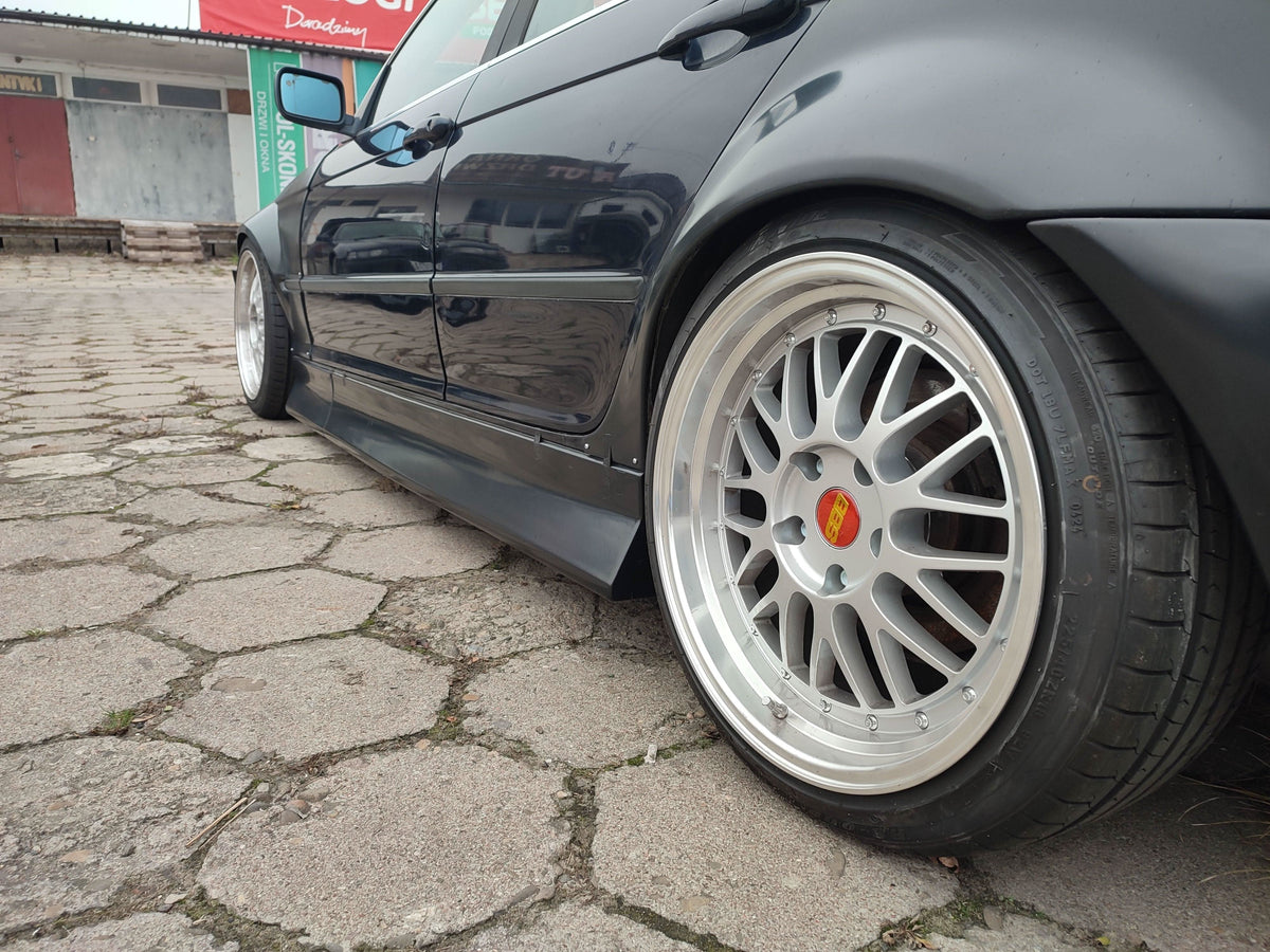 BMW 3-Series E46 sedan JDM body kit by K2 Industries, featuring ABS plastic front and rear bumper parts.