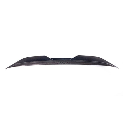 BMW G42 and G87 M2 carbon fiber trunk spoiler by Palenon Performance, shown on a sleek car with a sporty aerodynamic design.