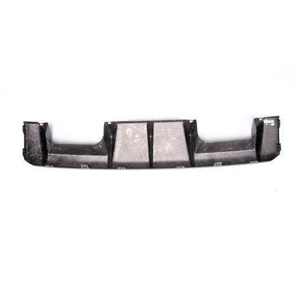 Carbon fiber rear diffuser for BMW G80 M3 and G82/G83 M4, designed by Palenon Performance, shown on a car.