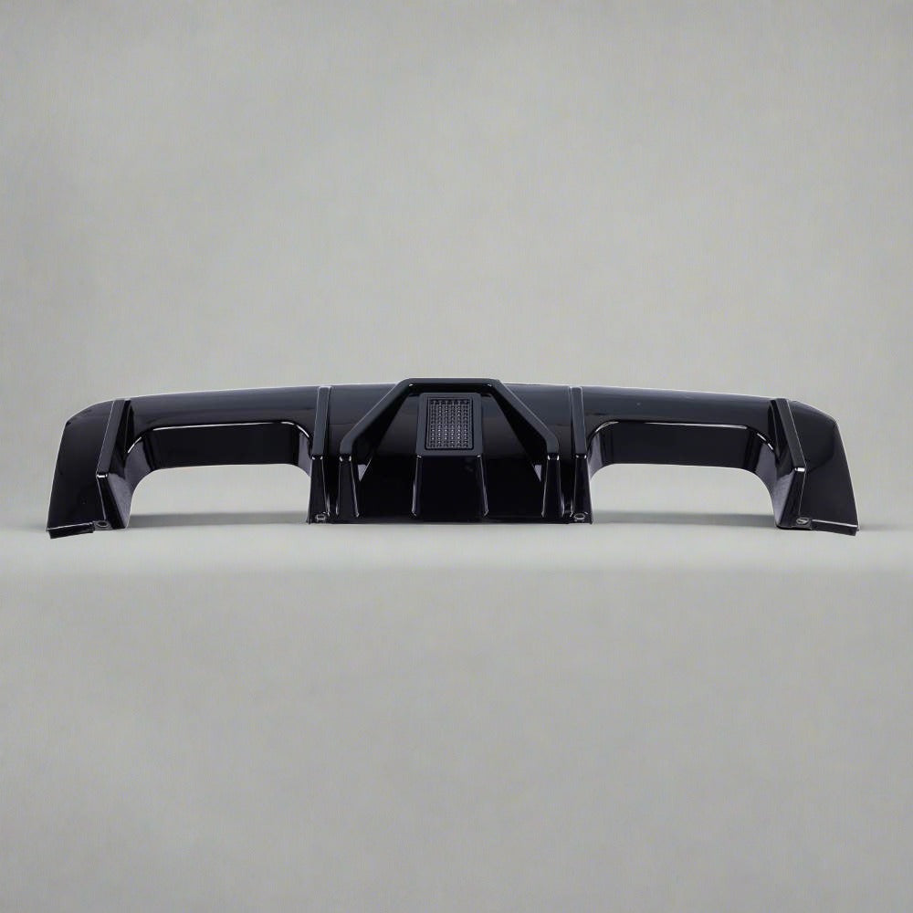 BMW G80 M3 and G82 M4 ABS V Style LED rear diffuser by Palenon Performance with integrated LED lights and aerodynamic design.