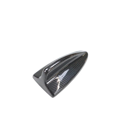 Black carbon fiber roof antenna cover for BMW E82, E87, E90, E92, and E93 models by Palenon Performance.