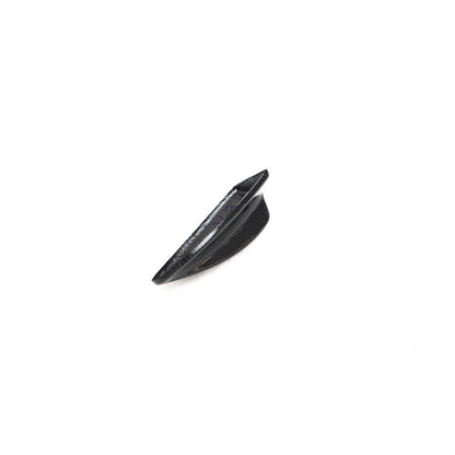 Black carbon fiber roof antenna cover for BMW E82, E87, E90, E92, E93 by Palenon Performance, shown on a vehicle roof.