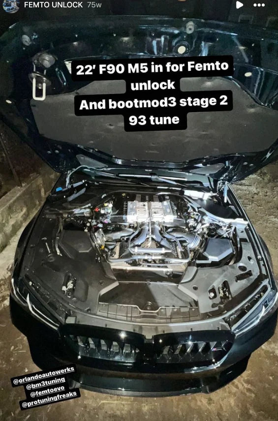 BMW ECU full unlock and Bootmod3 tuning performed by BOOTMOD3 TUNING USA, showing a technician working on the vehicle's engine control unit.