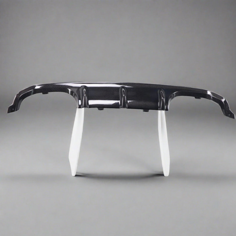 BMW F80 M3 and F82/F83 M4 carbon fiber rear diffuser by Palenon Performance, showcasing sleek, lightweight aerodynamic design.
