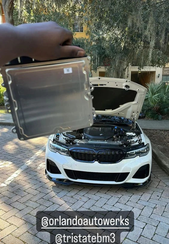 BMW ECU full unlock and Bootmod3 tuning by BOOTMOD3 TUNING USA, showing the ECU unit and tuning interface.