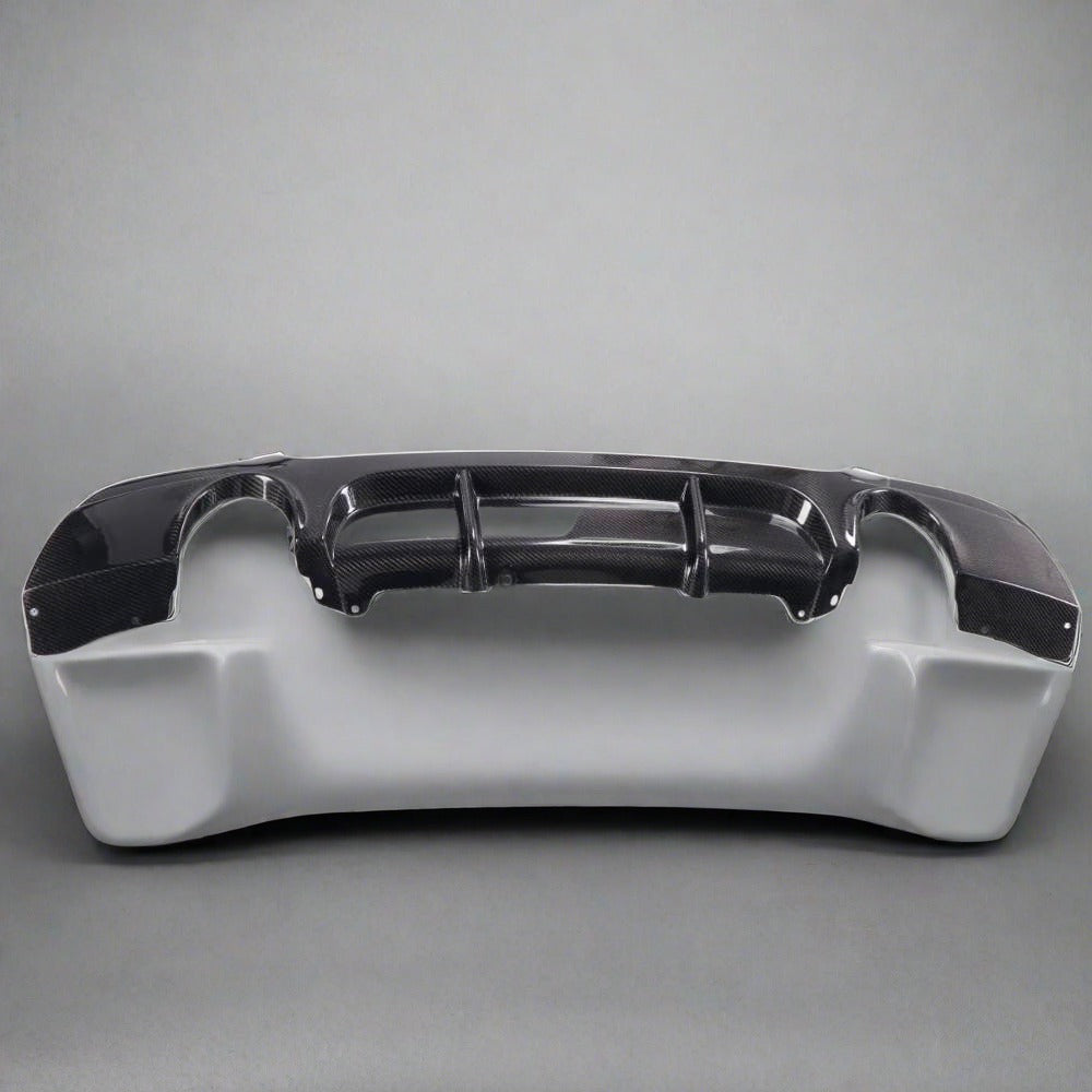 BMW E92 328i/335i M Tech carbon fiber rear diffuser by Palenon Performance, shown installed on the vehicle's rear.