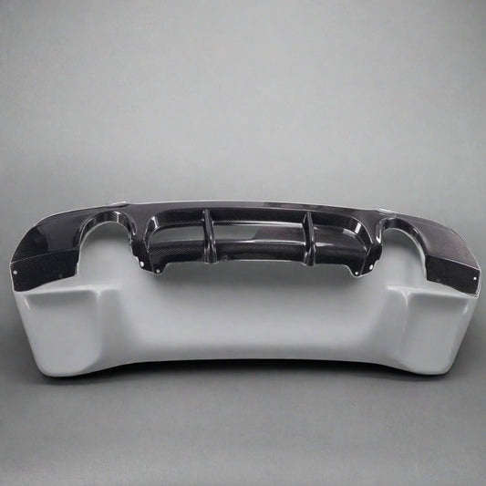 BMW E92 328i/335i M Tech carbon fiber rear diffuser by Palenon Performance, shown installed on the vehicle's rear.
