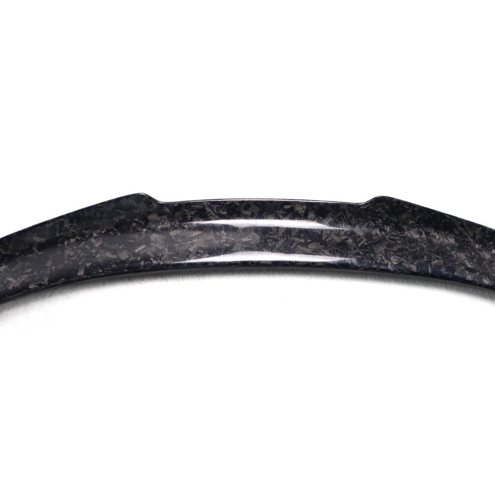 Forged carbon BMW F82 M4 trunk spoiler by Palenon Performance, showcasing its sleek, aerodynamic design on the vehicle.