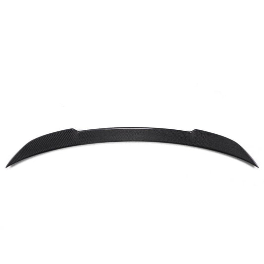 Carbon fiber trunk spoiler for BMW F30 and F80 M3 CS, designed by Palenon Performance, mounted on a sleek vehicle.