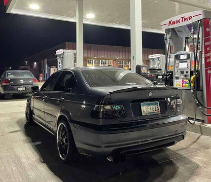 BMW 3 Series E46 sedan smoked tail lights by K2 Industries, showing the dark tinted lens design for model years 1999-2001.
