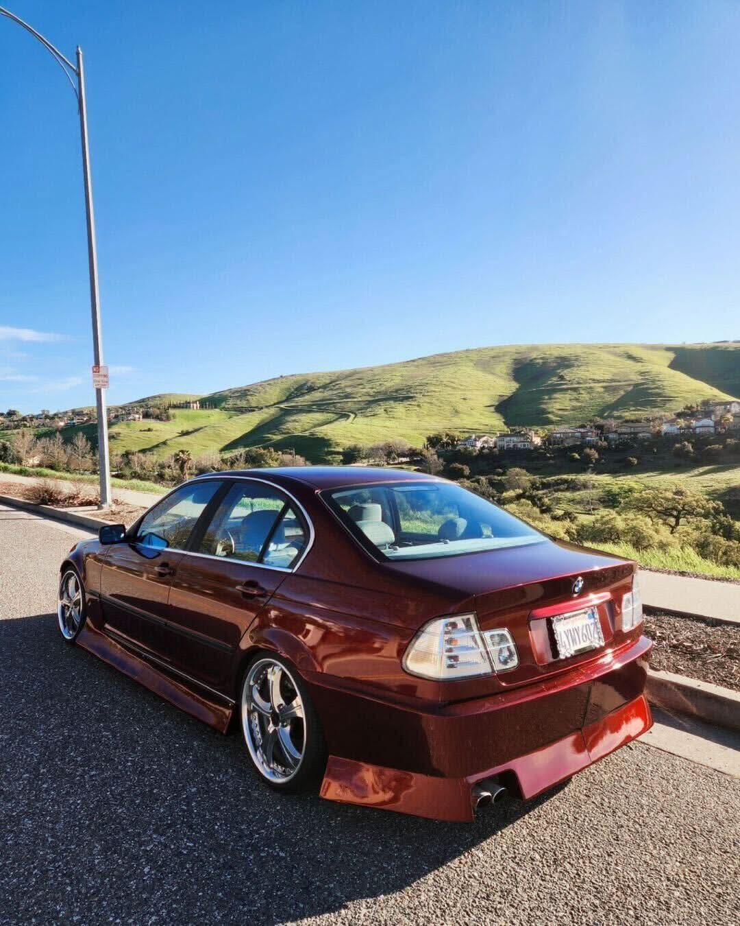 BMW 3-Series E46 sedan clear tail lights by K2 Industries, showing the sleek, transparent design for model years 1998-2006.