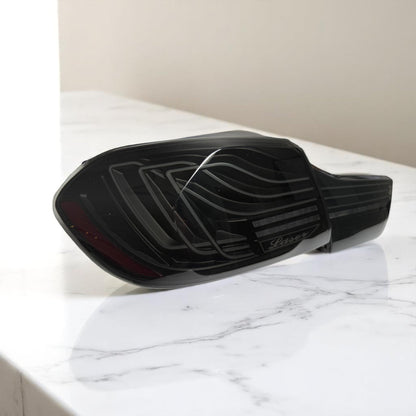 BMW F82 M4 and F32 430i, 435i, 440i, 420i, 428i CSL laser tail lights by Palenon Performance, close-up of sleek LED taillight design.