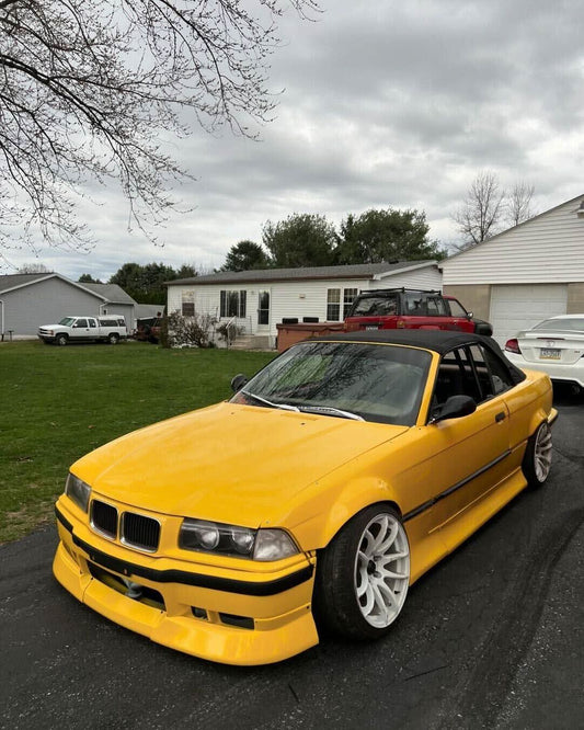 BMW 3-Series E36 coupe convertible with JDM style ABS plastic body kit, featuring sleek, aerodynamic design and custom styling.