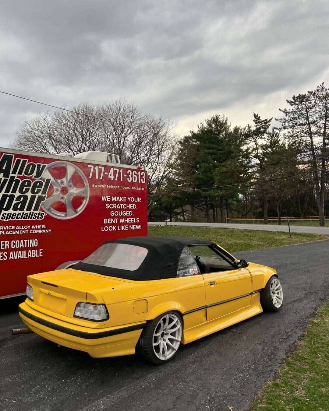 BMW 3-Series E36 coupe convertible with JDM style body kit by K2 Industries, made of ABS plastic, shown on a white background.